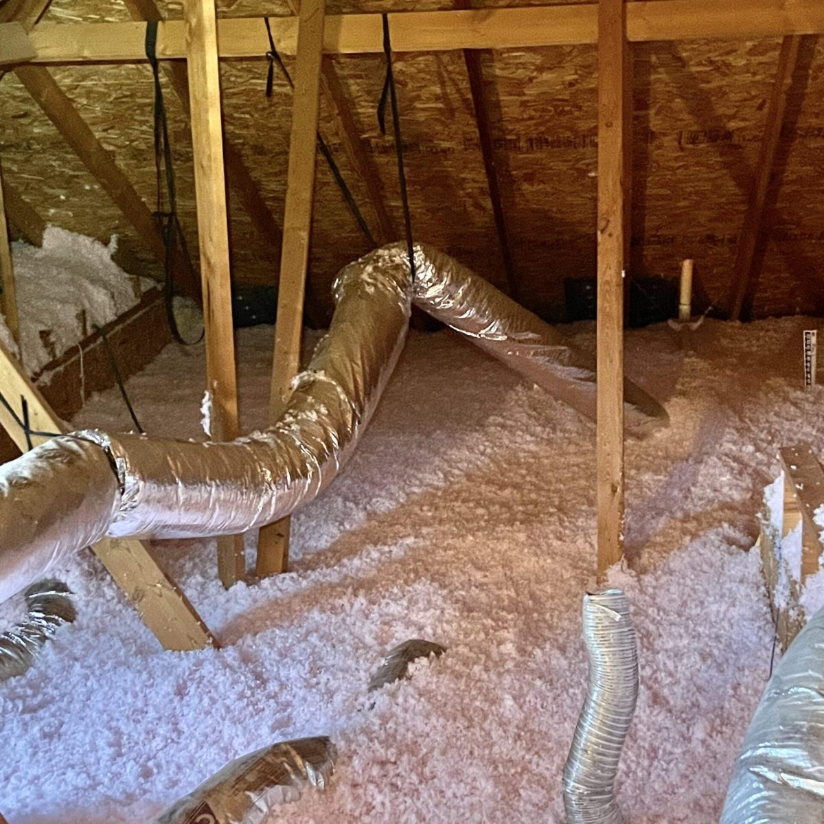 Blown-in fiberglass attic Insulation by Elite Insulation Specialist